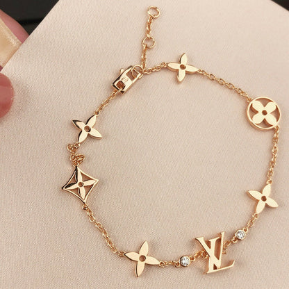 [Riva Jewelry ]STAR AND SUN 7 MOTIFS GOLD BRACELET