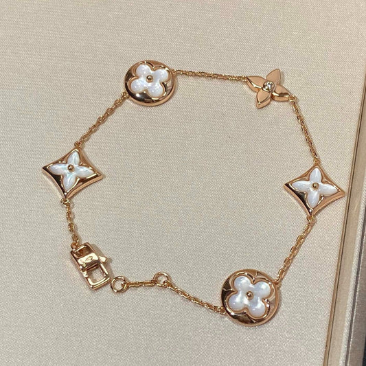 [Riva Jewelry]STERN- UND SONNENARMBAND MIT 5 MOTIVEN AUS MOP ROSÉGOLD