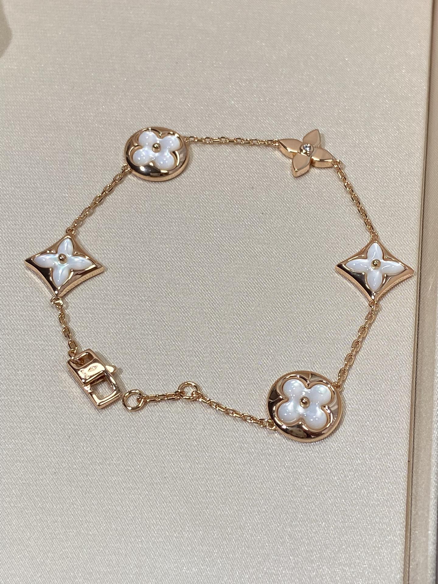 [Riva Jewelry]STERN- UND SONNENARMBAND MIT 5 MOTIVEN AUS MOP ROSÉGOLD