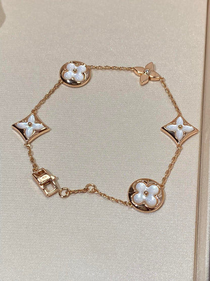 [Riva Jewelry]STERN- UND SONNENARMBAND MIT 5 MOTIVEN AUS MOP ROSÉGOLD