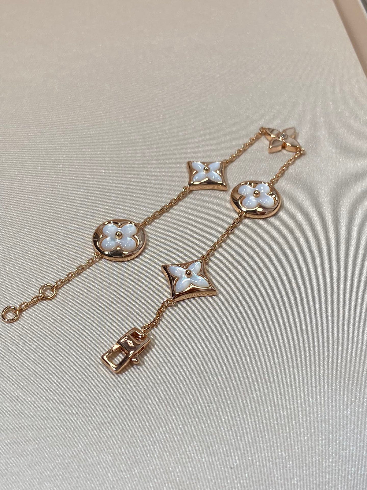 [Riva Jewelry ]STAR AND SUN 5 MOTIF MOP PINK GOLD BRACELET