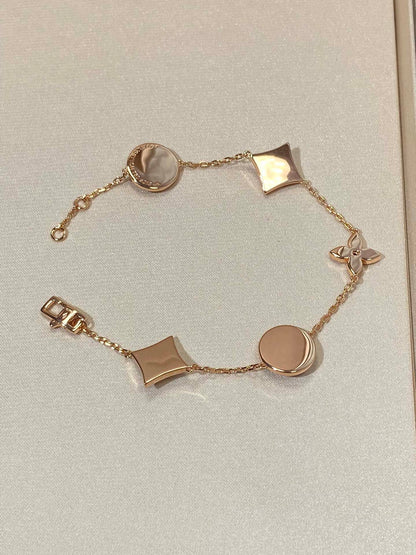 [Riva Jewelry]STERN- UND SONNENARMBAND MIT 5 MOTIVEN AUS MOP ROSÉGOLD