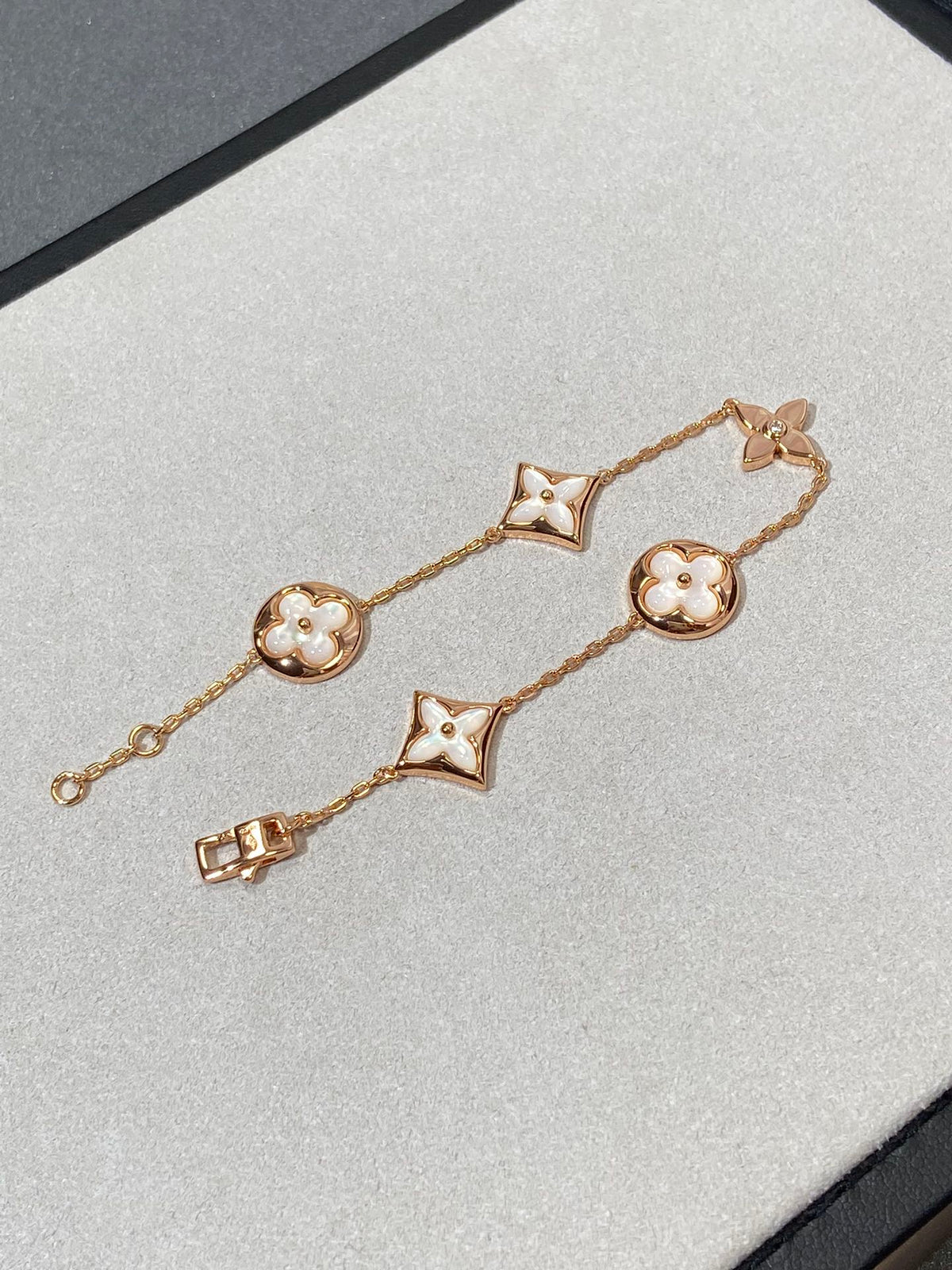 [Riva Jewelry ]STAR AND SUN 5 MOTIF MOP PINK GOLD BRACELET