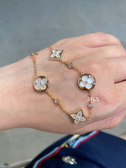 [Riva Jewelry ]STAR AND SUN 4 MOTIF WHITE MOP PINK GOLD BRACELET