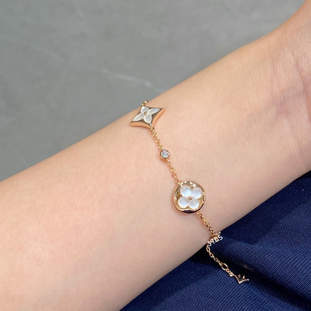 [Riva Jewelry ]STAR AND SUN 4 MOTIF WHITE MOP PINK GOLD BRACELET