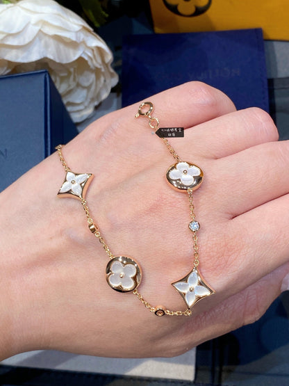 [Riva Jewelry ]STAR AND SUN 4 MOTIF WHITE MOP PINK GOLD BRACELET