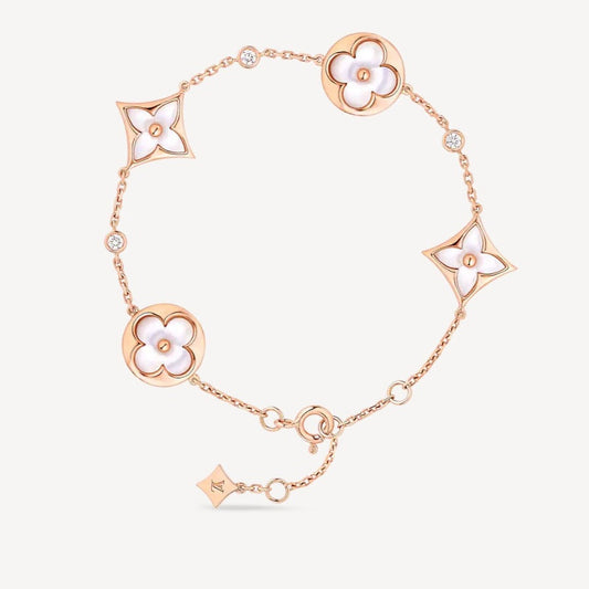 [Riva Jewelry]ARMBAND "STERN UND SONNE 4 MOTIVE" MIT WEISSEM PERLMUTT UND ROSÉGOLD