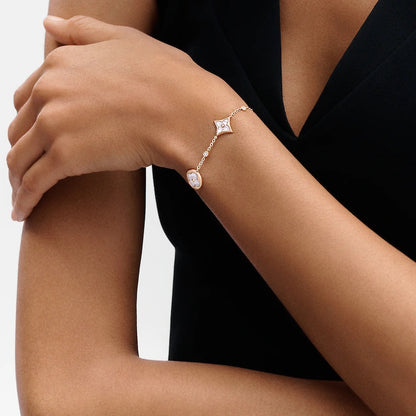[Riva Jewelry ]STAR AND SUN 4 MOTIF WHITE MOP PINK GOLD BRACELET
