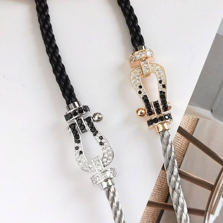 [Riva Jewelry]ARMBAND GROSSES HUFEISEN SCHWARZ-WEISSE DIAMANTEN - ROSÉGOLD